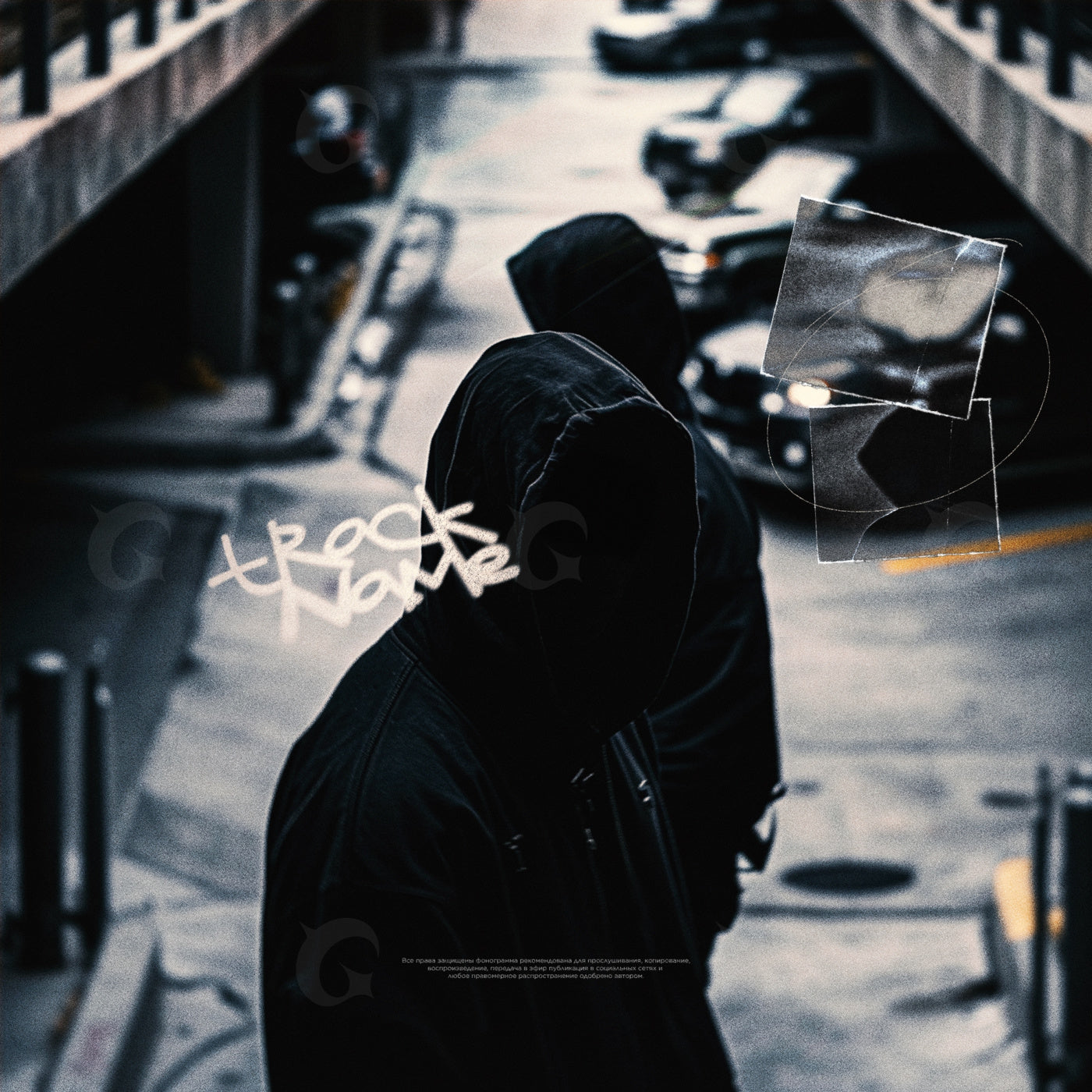 Hooded figures walking