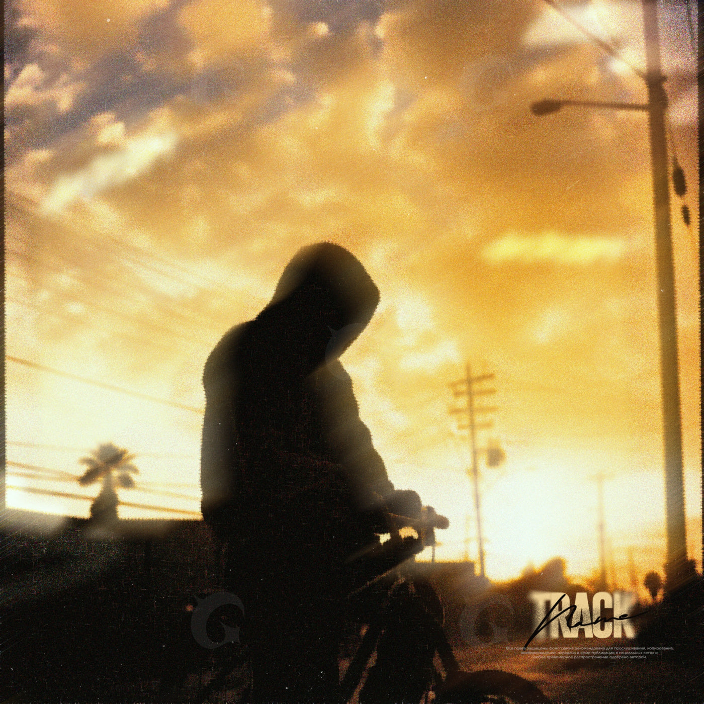 Hooded rider sunset