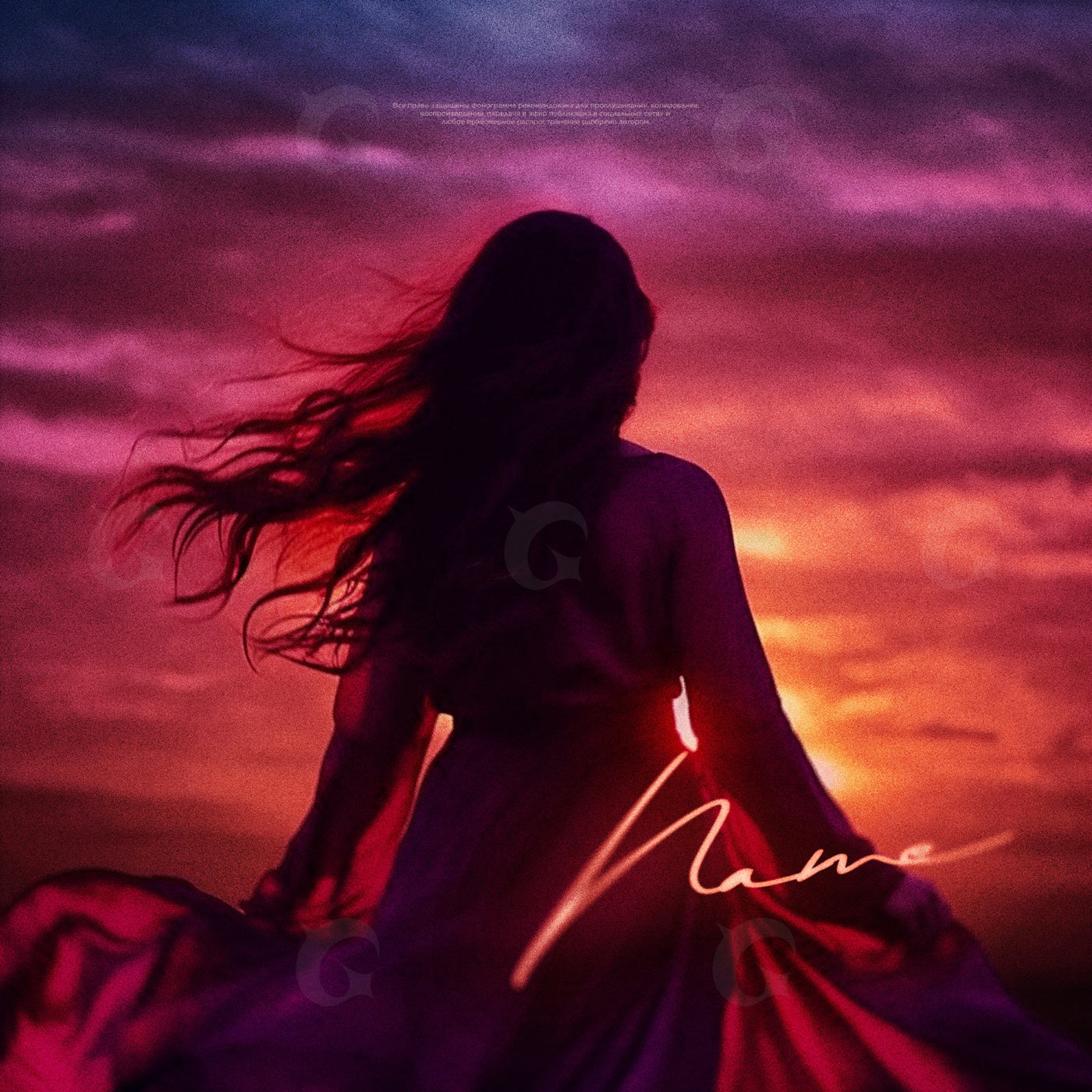 Woman facing sunset