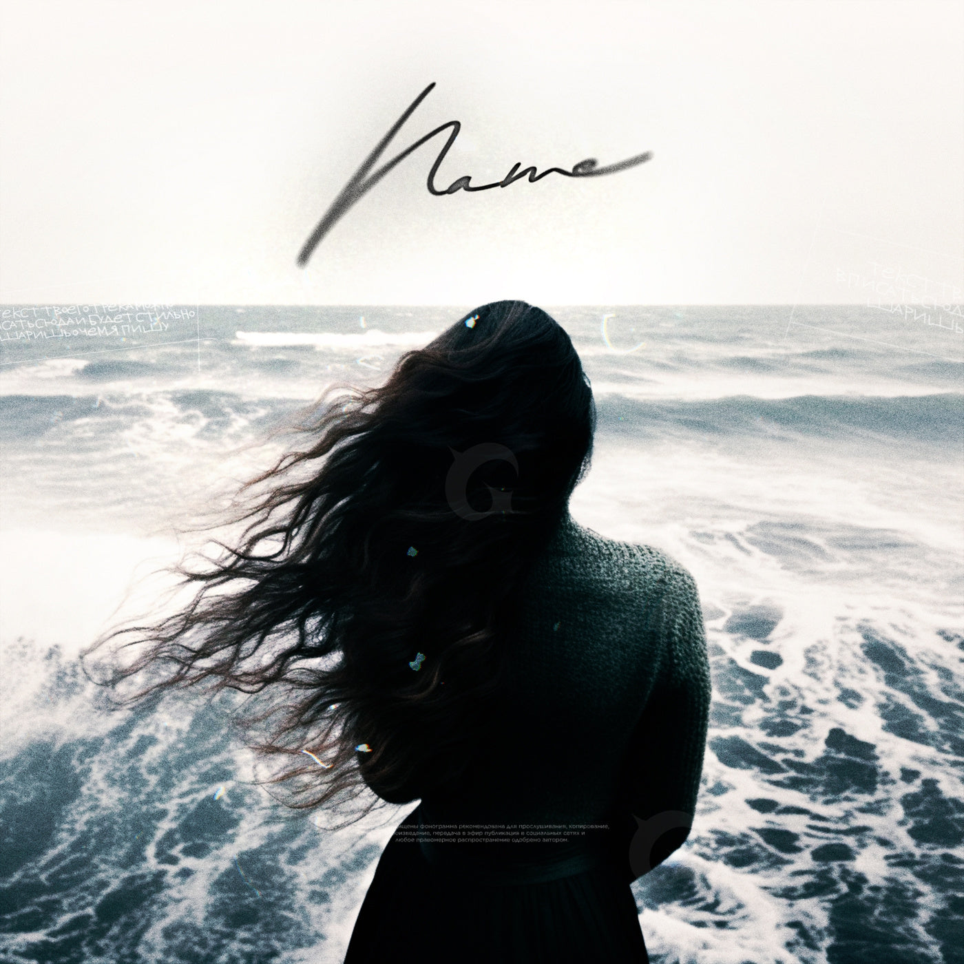 Woman facing sea