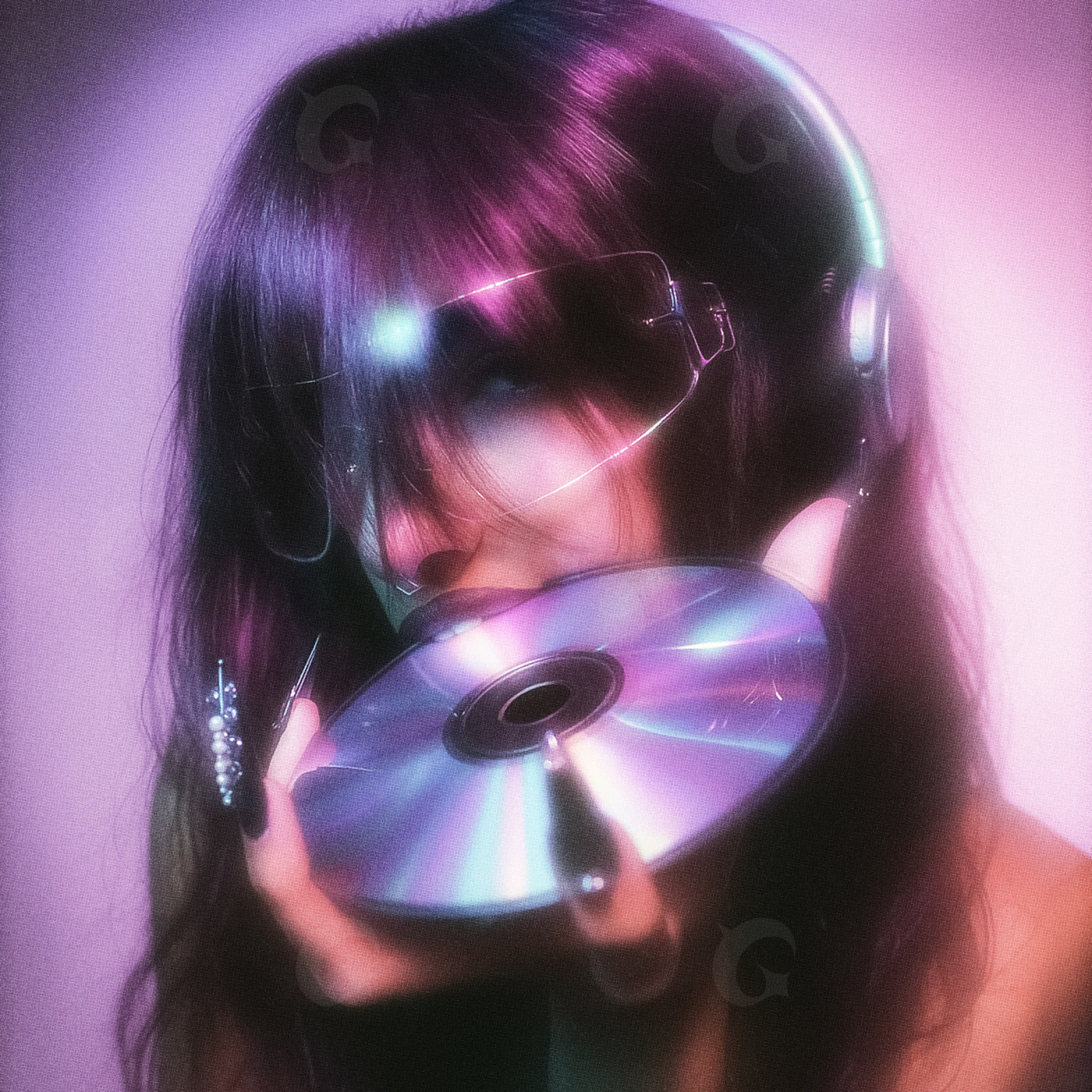 Headphone girl holding disc