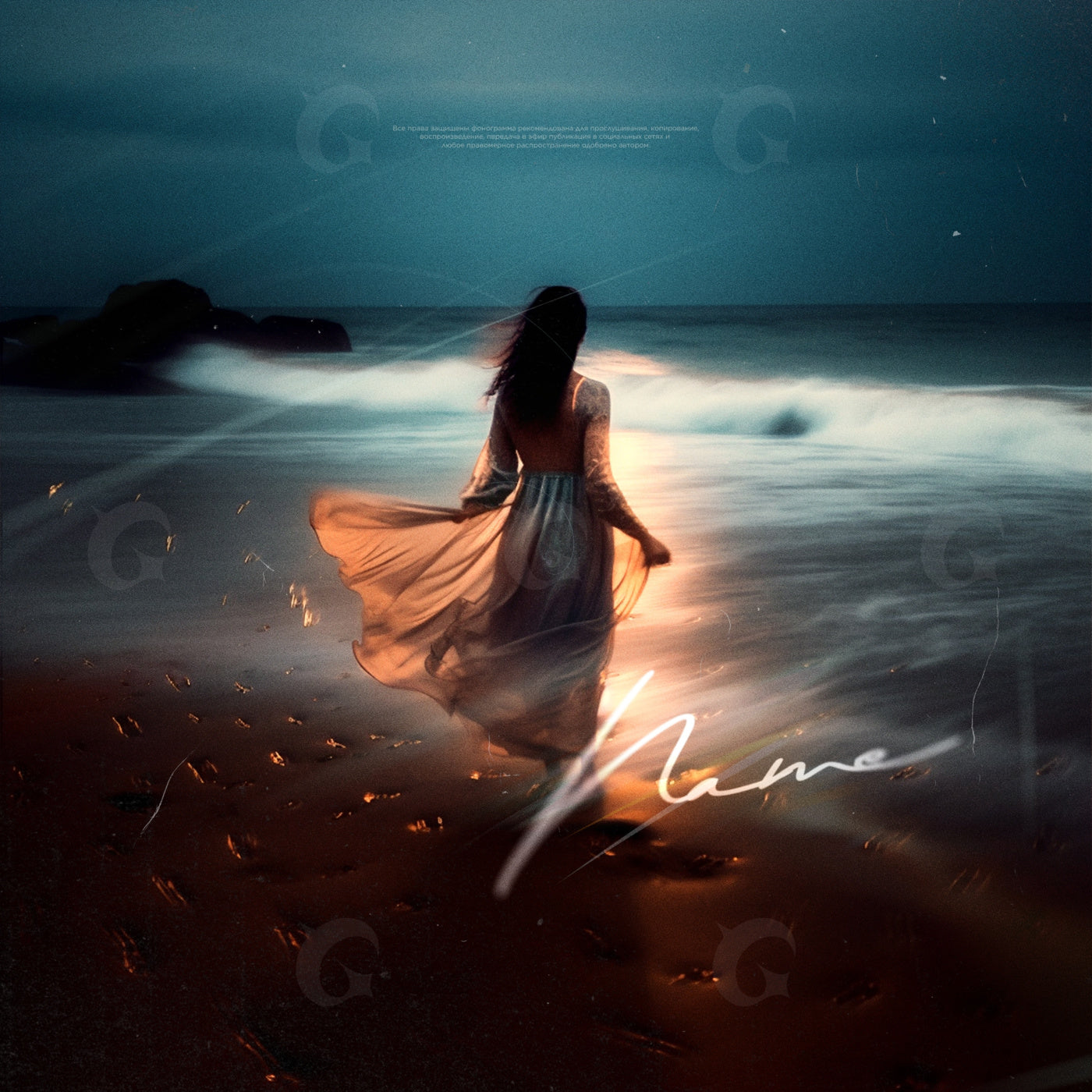 Woman walking shoreline